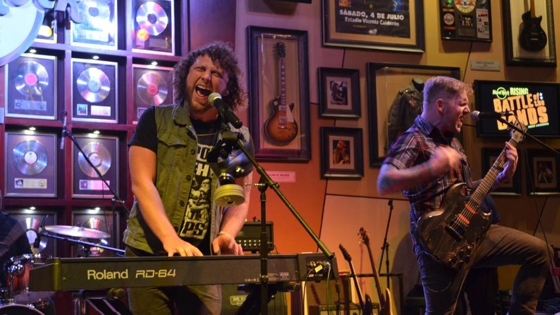 Wild Fire set the Hard Rock Café on fire with a rousing set that earned them first place live competition round in the Hard Rock Rising Battle of the Bands on Thursday. Pictured are lead singer Zack Sawyer and guitarist Taylor Roberts. Not pictured are bassist Tyler Voss and drummer Cameron Alidor.