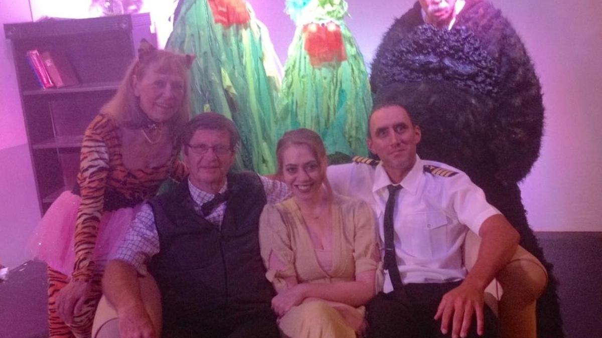 Cast of The Enigma: Jim Codling, Theresa Geboy, Jeremiah Wright. Standing left to right: Cheryl Grace, Jen Coulter, Jay Kelton, Terry Cullen.