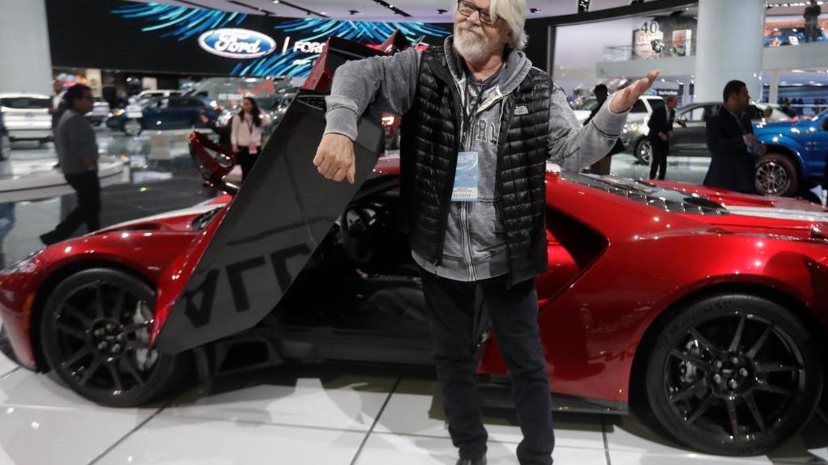 Singer Bob Seger shows his approval after sitting in the Ford GT on display at the North American International Auto show, Tuesday, Jan. 10, 2017, in Detroit.
