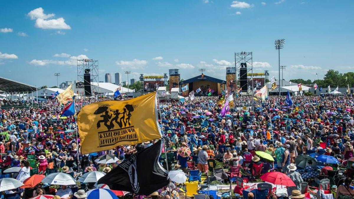 Festival goers attend the New Orleans Jazz and Heritage Festival on Saturday, May 6, 2017, in New Orleans.