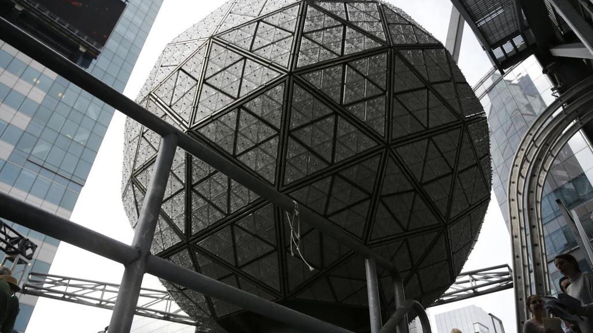 The New Year's Eve ball rests at the top of a building overlooking Times Square, in New York, Tuesday, Dec. 27, 2016. The dropping of the ball has been a tradition in Times Square since 1907.