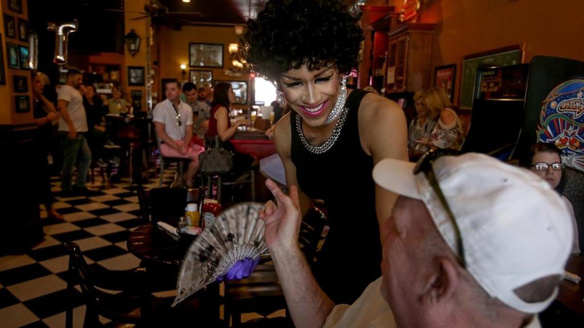 Drag performer Kara Mel D’Ville talks with guests at a drag bunch at Big Mike’s Speakeasy in downtown Gulfport on Sunday, March 26, 2017. The event supported the inaugural Gulf Coast Equality Fest.