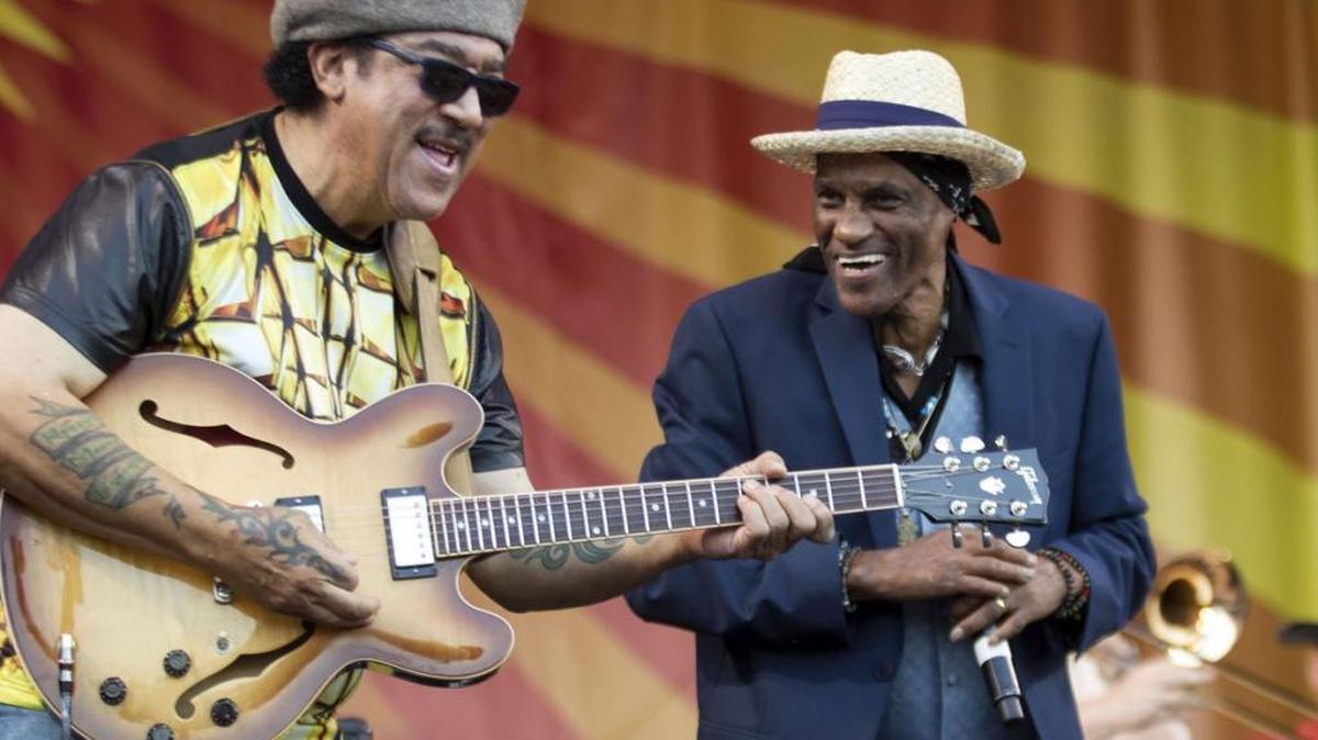 Guitarist Leo Nocentelli, left and singer Cyril Neville of the Meters perform on the Acura Stage during the New Orleans Jazz and Heritage Festival on Sunday, May 3, 2015, at the Fairgrounds. The Meters will receive a Lifetime Achievement Award from the Grammys organization this year.