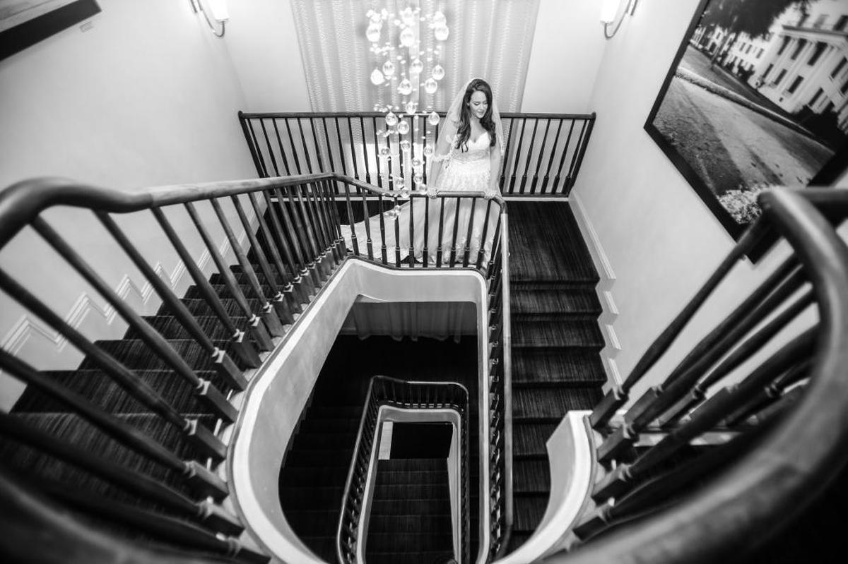 The White House Hotel in Biloxi is always a beautiful spot and has several different options for photos. Take bridals on the staircase and get a cool couple’s shot at the bar. Do family portraits near the pool area in the green space outside.