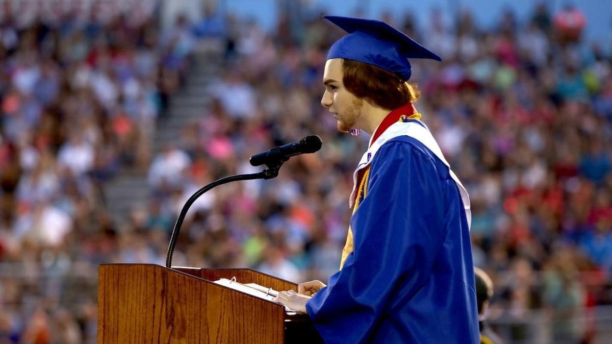 Trevor Ladner addresses his fellow students and their guests during Hancock High’s graduation in 2016. Ladner was salutatorian of his class and now attends Harvard.