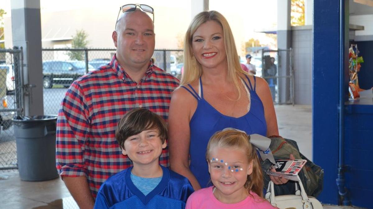 Colton and Caden White, Josh Bryan and Christie White at the Gulfport at Ocean Springs game