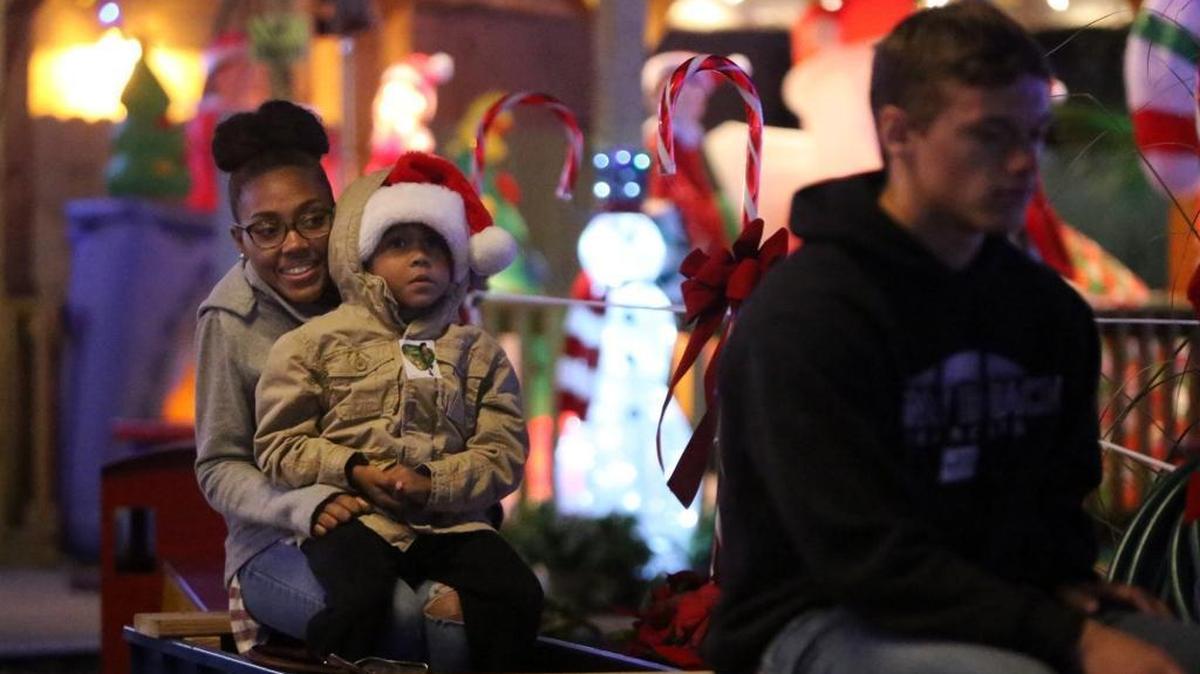 Crystal Hamilton of Gulfport and her son, Tevin, 4, ride one of the trains at the Mississippi Coast Model Railroad Museum in Gulfport on Thursday, Dec. 15, 2016. More displays and fun were added since last year.