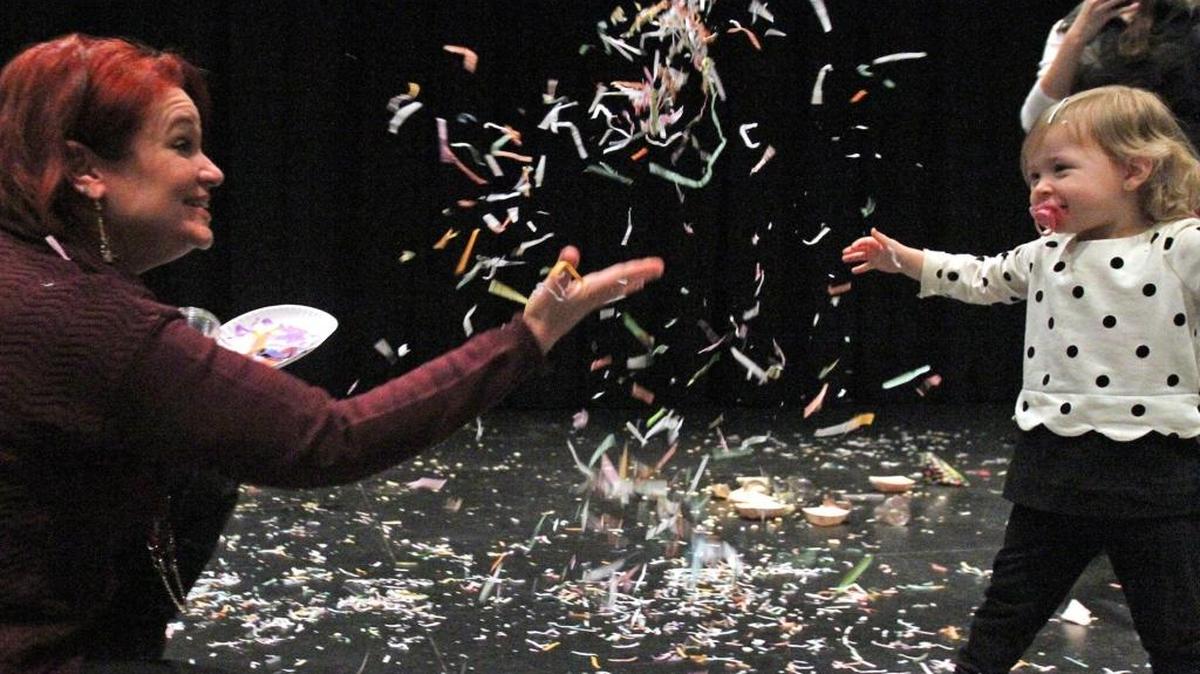 Elizabeth Thomas of Biloxi and Mary Collins Smith, 2, of Gulfport play with the confetti during the Lynn Meadows Discovery Center’s Countdown to Noon New Year’s celebration Dec. 31, 2014. On Sunday, the children’s museum in Gulfport will celebrate its 19th birthday with special activities.
