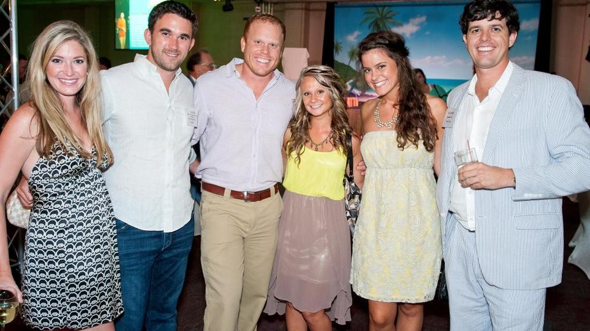 Leigh and Kenneth Jones, Michael Mount, Hannah Seymour, Madison Mount and Chris Fore at the Don't Worry Be Happy, Mon! bachelor and bachelorette auction, a fundraiser for the Mississippi Health Association of South Mississippi.