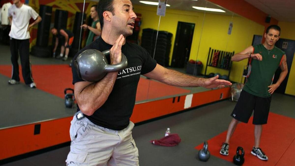 Mike Diamond leads a kettlebell class at St. Louis Self-Defense and Fitness in St. Louis, Missouri. (Elie Gardner/St. Louis Post-Dispatch/MCT)