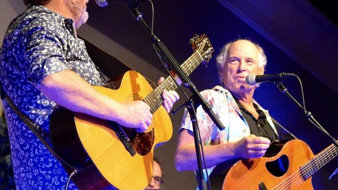 Jimmy Buffett surprised an audience at Mac McAnally’s concert at the Grand Magnolia in Pascagoula on Saturday.