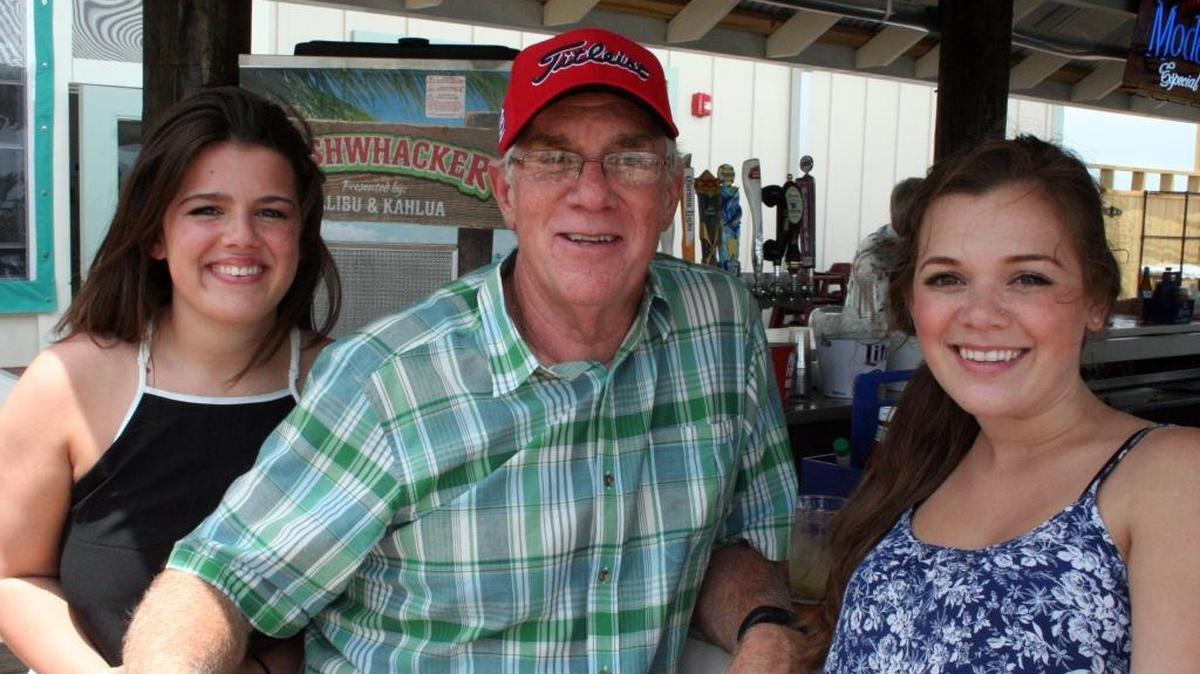 Erinn Kitch, John Kitch and Sydney Island at Ajax Seafood Kitchen & Bar in Gulfport