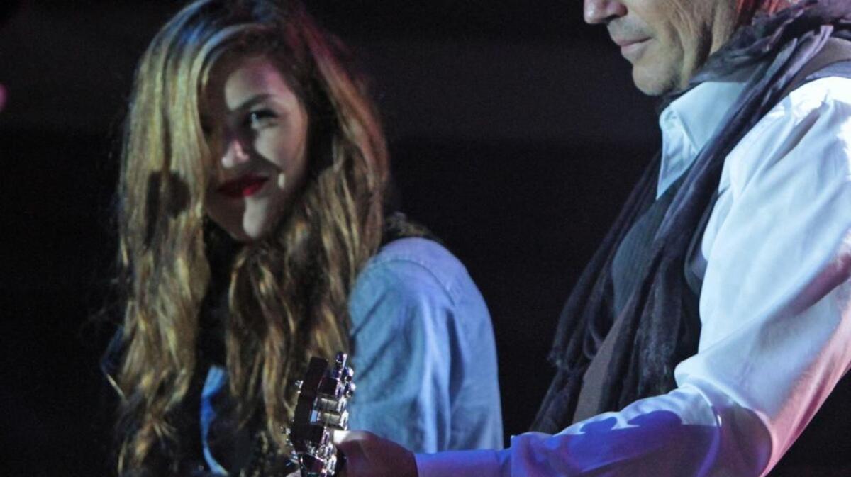 Kevin Costner and his daughter, Lily, play with his band Modern West during the Sun & Sand Film & Music Festival concerts at Jones Park in Gulfport on Saturday Nov. 10, 2012. Costner will be at the Brownstone Center for the Arts in Poplarville on Friday.