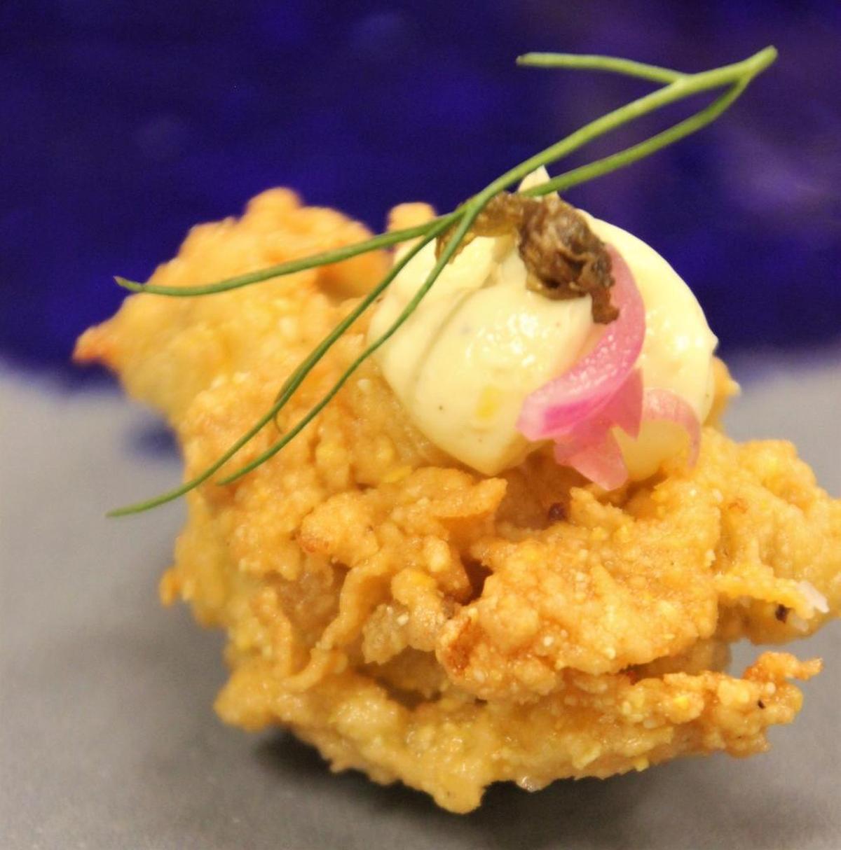 A perfectly fried Gulf oyster served at White Pillars.