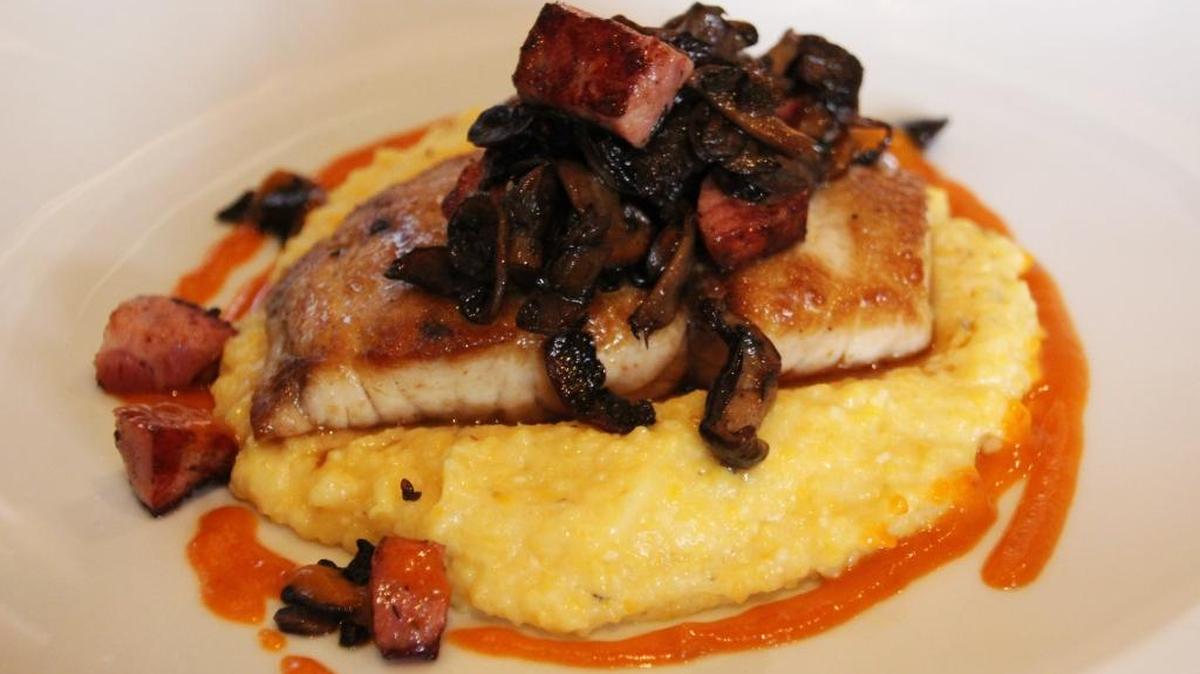 Red fish served on a bed of creamy grits was a daily special and divine.