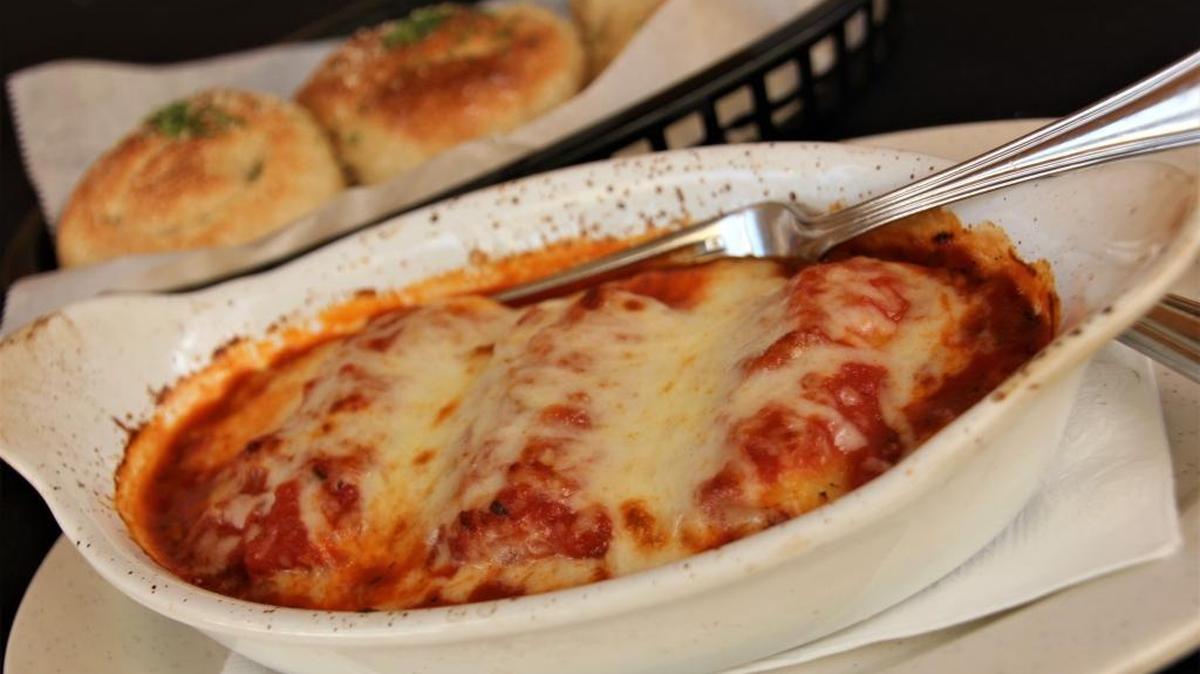 The perfect lunch — manicotti and fresh baked bread at Italian Garden in Ocean Springs.
