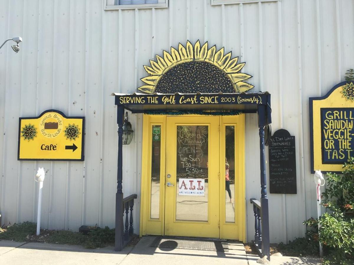 Serious Bread’s front door faces the parking lot of the building at 131 Main St. in Bay St. Louis. The bakery and Bay Books in the same building will close in March.