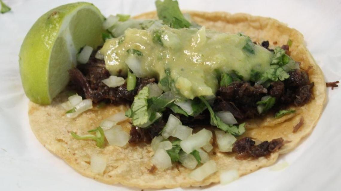 Classic Mexican taco with chunky salsa verde.