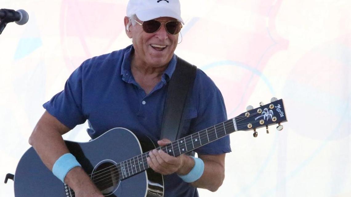 Jimmy Buffett performs on the beach in Pascagoula during a ceremony dedicating a bridge in his honor in 2015.