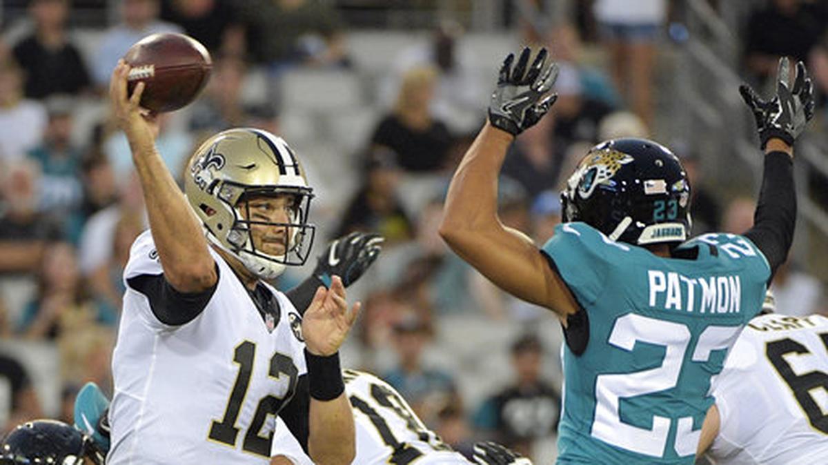 New Orleans Saints quarterback Tom Savage (12) throws a pass over Jacksonville Jaguars defensive back Tyler Patmon (23) on Thursday, Aug. 9, 2018, in Jacksonville, Fla. Understanding the line and shopping around for the best spread can mean the difference between winning and losing a bet.