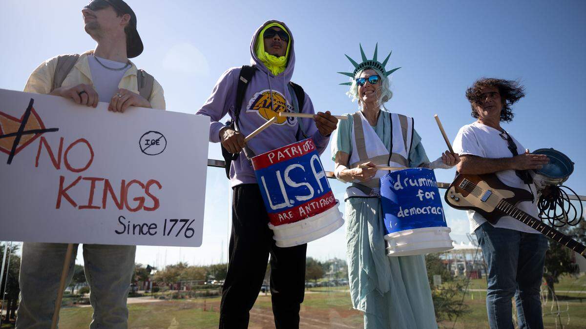 Protesters beat their drums as protesters march during a No Kings protest in Gulfport on Saturday, October. 18, 2025.