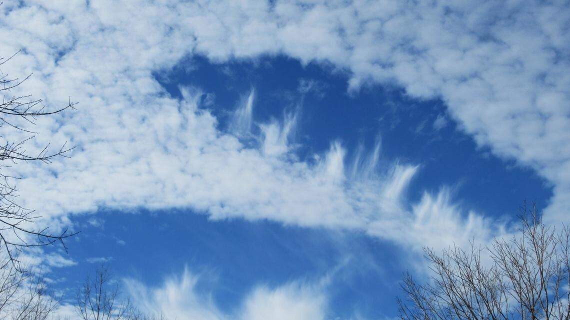 Several fallstreak holes, or “hole punch clouds,” were spotted across parts of northern Georgia on Friday. Here’s how the rare clouds form.