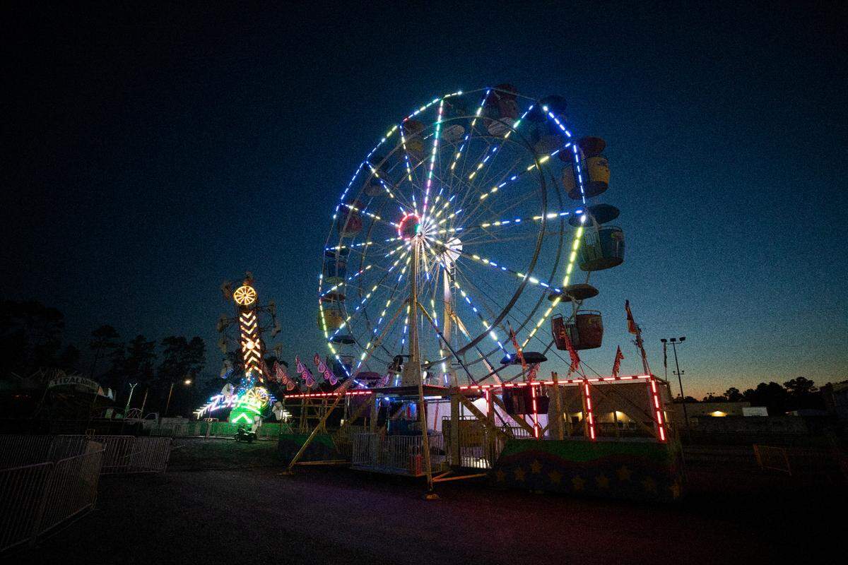 The Ferris wheel at the Hancock County Fair in Kiln calls people to enjoy the rides, games, rodeo and food. It’s the start of festival season in South Mississippi and the fair is among the first events.