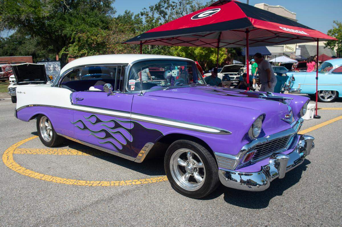 A Chevrolet Bel-Air with a fiery purple paint job at Cruisin’ The River City in Moss Point during Cruisin’ The Coast on Tuesday, Oct. 8, 2024.
