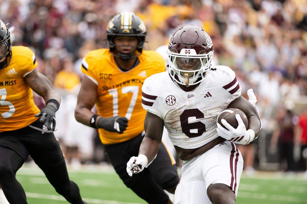 Mississippi State running back Davon Booth (6) picks up yards Saturday against Southern Miss at M. M. Roberts Stadium.