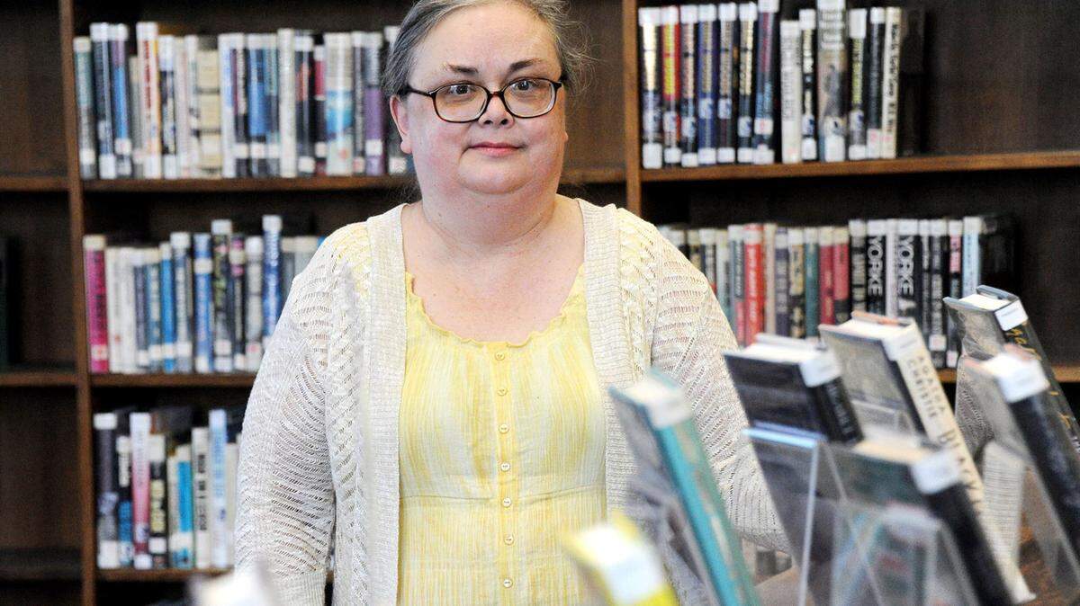 Beth Moody searched through the Altoona Tribune newspapers and found 20 Holocaust-related events from the 1930s and 1940s for the Holocaust Museum's "History Unfolded" project. (Lake Fong/Pittsburgh Post-Gazette/TNS)