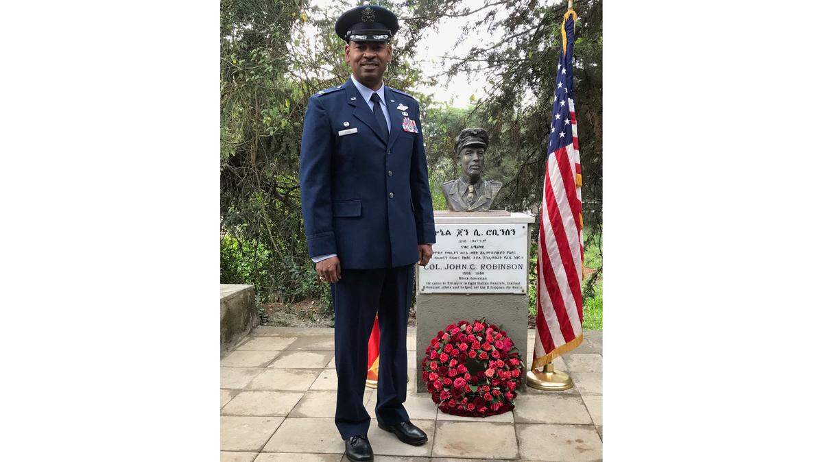 Col. Edward H. Evans, Jr., commander of the 186th Air Refueling Wing in Meridian, Mississippi, stands at the grave of Col. John C. Robinson in Addis Ababa, Ethiopia, June 5, 2018. Evans spoke at a wreath laying ceremony that honored the legacy of Robinson, who led the Ethiopian Air Force in the 1930s and later became known as the “Father of the Tuskegee Airmen.