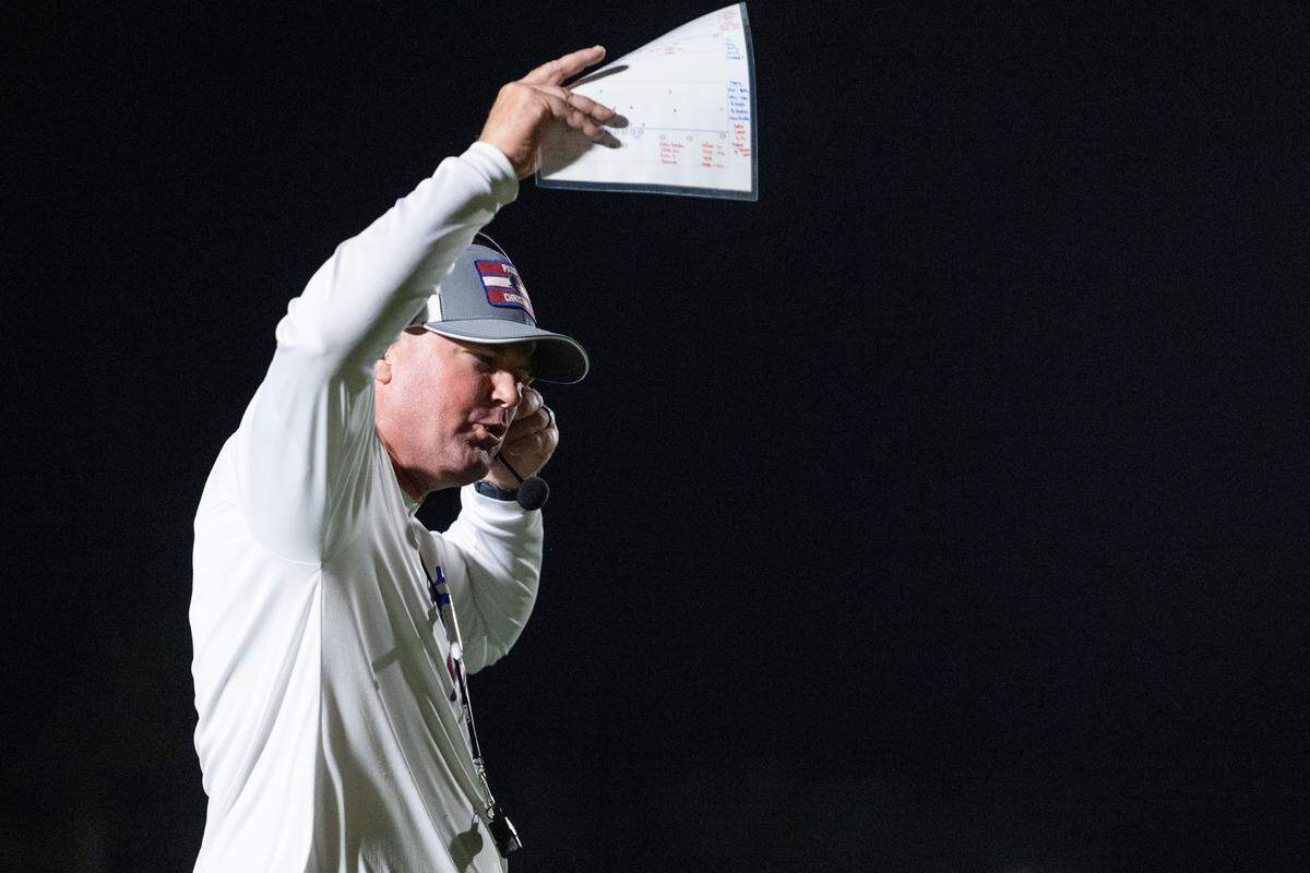 Pass Christian head coach Jeff Stockstill shouts to his players from the sideline Friday.