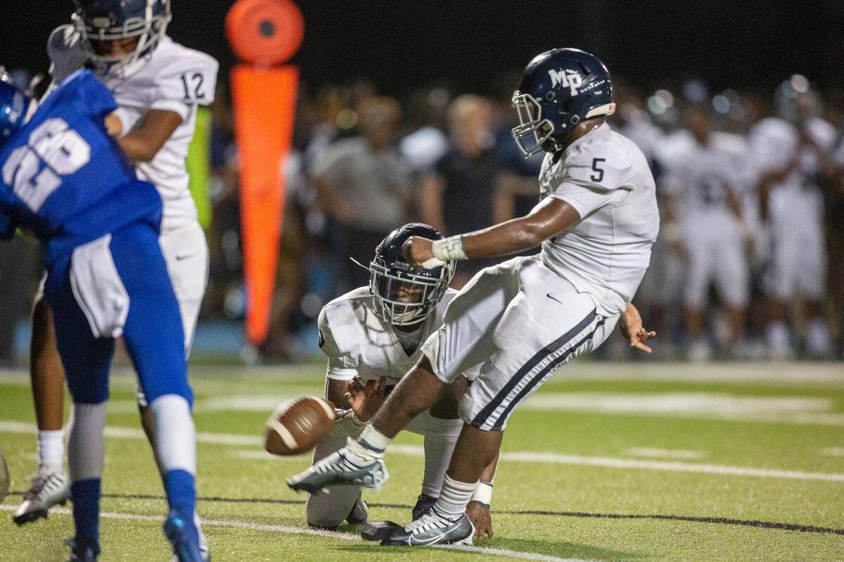Moss Point’s Kaleb Raston (5) kicks for an extra point during a game against Vancleave at Vancleave Football Stadium in Vancleave on Friday, Sept. 9, 2022.