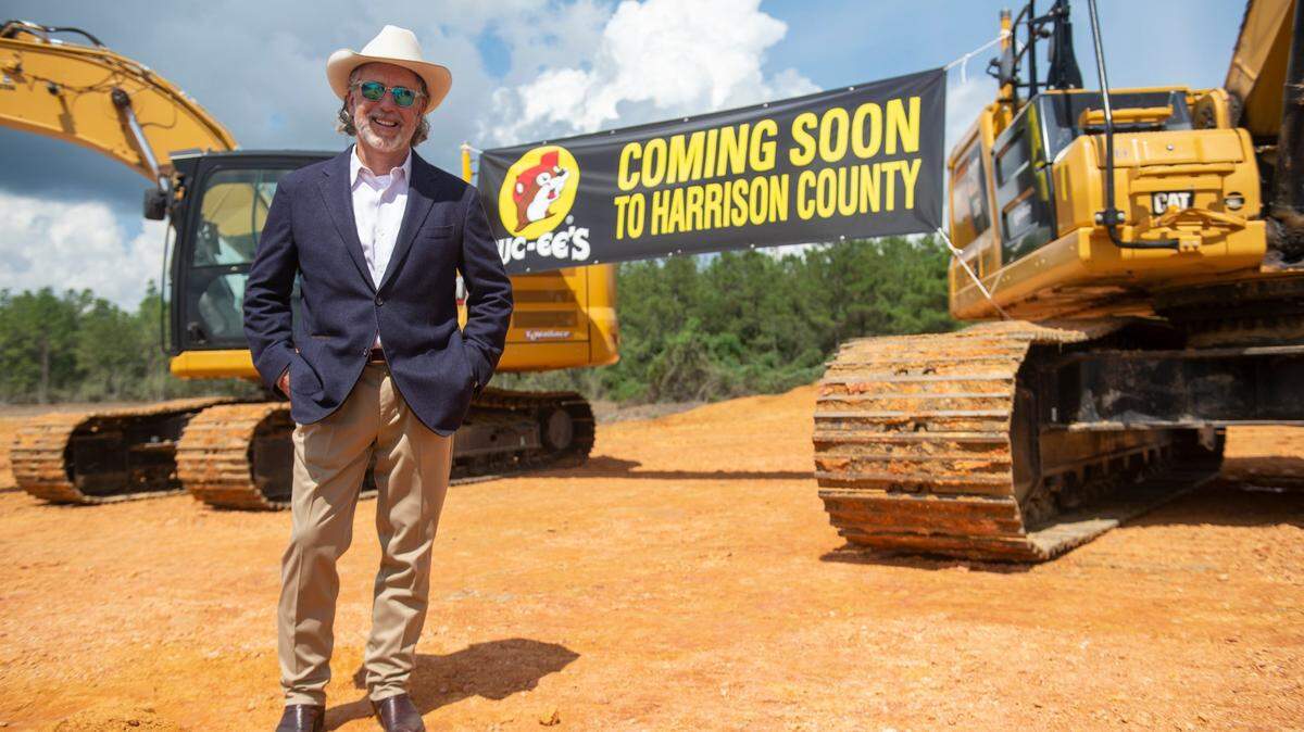 Buc-ee’s founded and owner Arch “Beaver” Aplin poses for a photo at the site of the future Harrison County Buc-ees after a ground breaking for the travel station on Sept. 12, 2023. Readers are eager for information about progress as construction is under way.