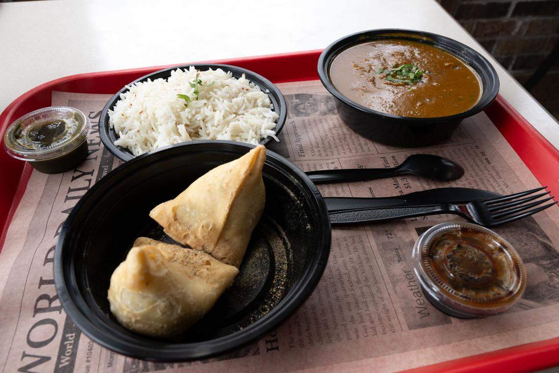 The samosas and lamb curry at I-10 Dhaba in Gulfport on Wednesday, April 22, 2026.