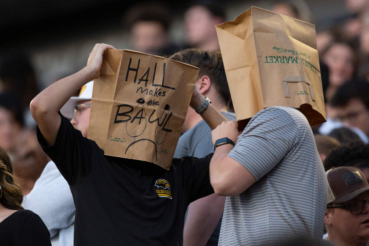 Southern Miss fans wear bags on their heads calling for Coach Will Hall’s firing during game between Southern Miss and Arkansas State at M.M. Roberts Stadium in Hattiesburg on Saturday, Oct. 19, 2024.