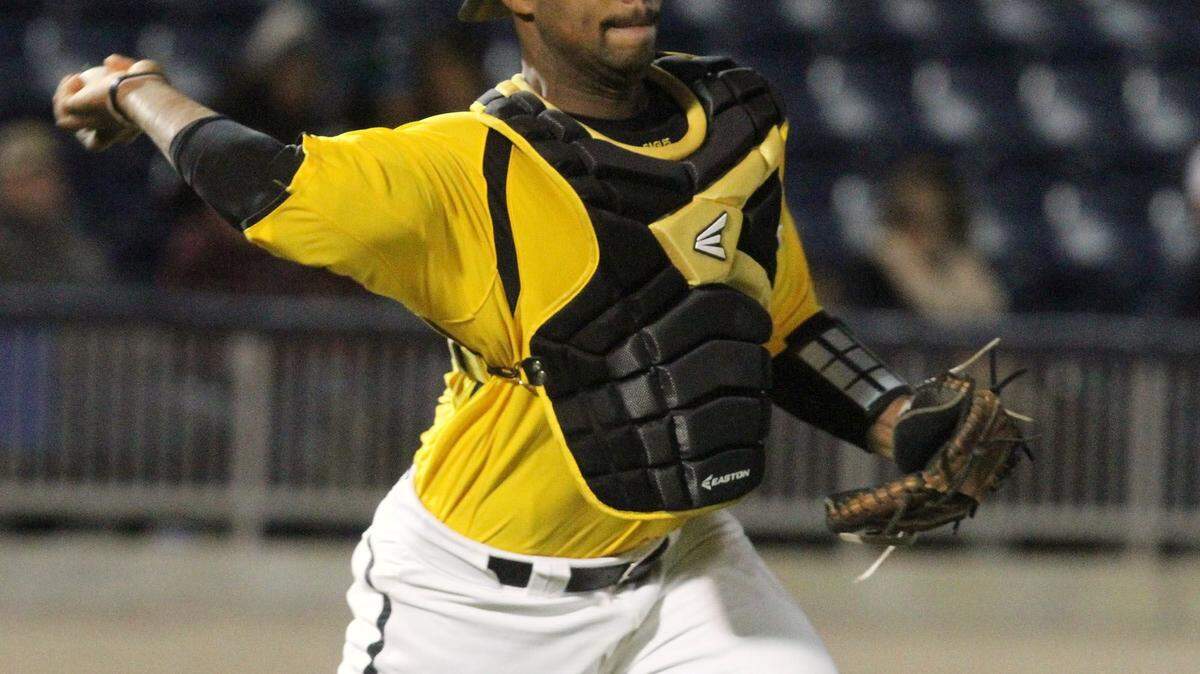 JOHN FITZHUGH/SUN HERALD 
 USM catcher Chuckie Robinson throws to first for the final out of the second inning of their game against Tulane at MGM Park in Biloxi on Tuesday March 22, 2016.