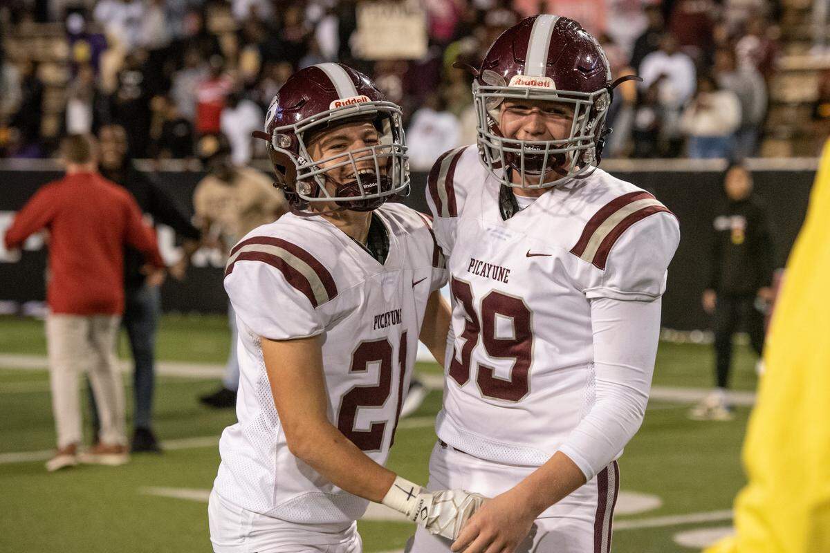 Picayune players celebrate after winning the 5A State Championship at M.M. Roberts Stadium in Hattiesburg on Friday, Dec. 2, 2022.
