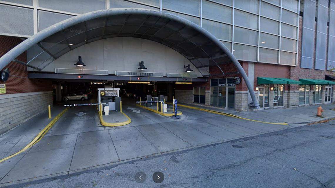 An Ohio State University graduate student was killed in a freak accident when her head became lodged between her car door and a parking garage kiosk in downtown Columbus.