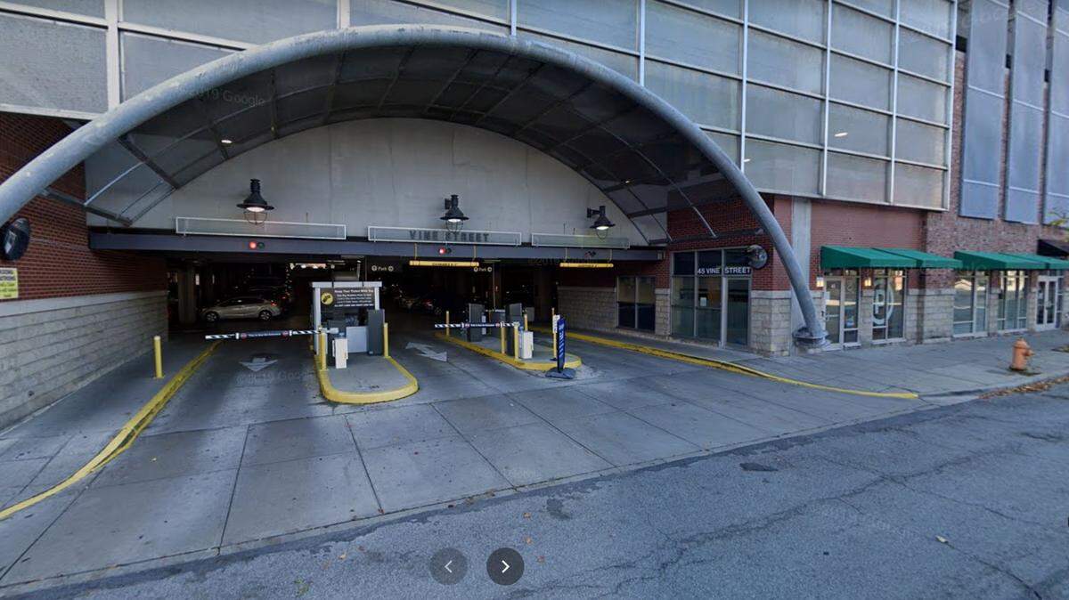 An Ohio State University graduate student was killed in a freak accident when her head became lodged between her car door and a parking garage kiosk in downtown Columbus.