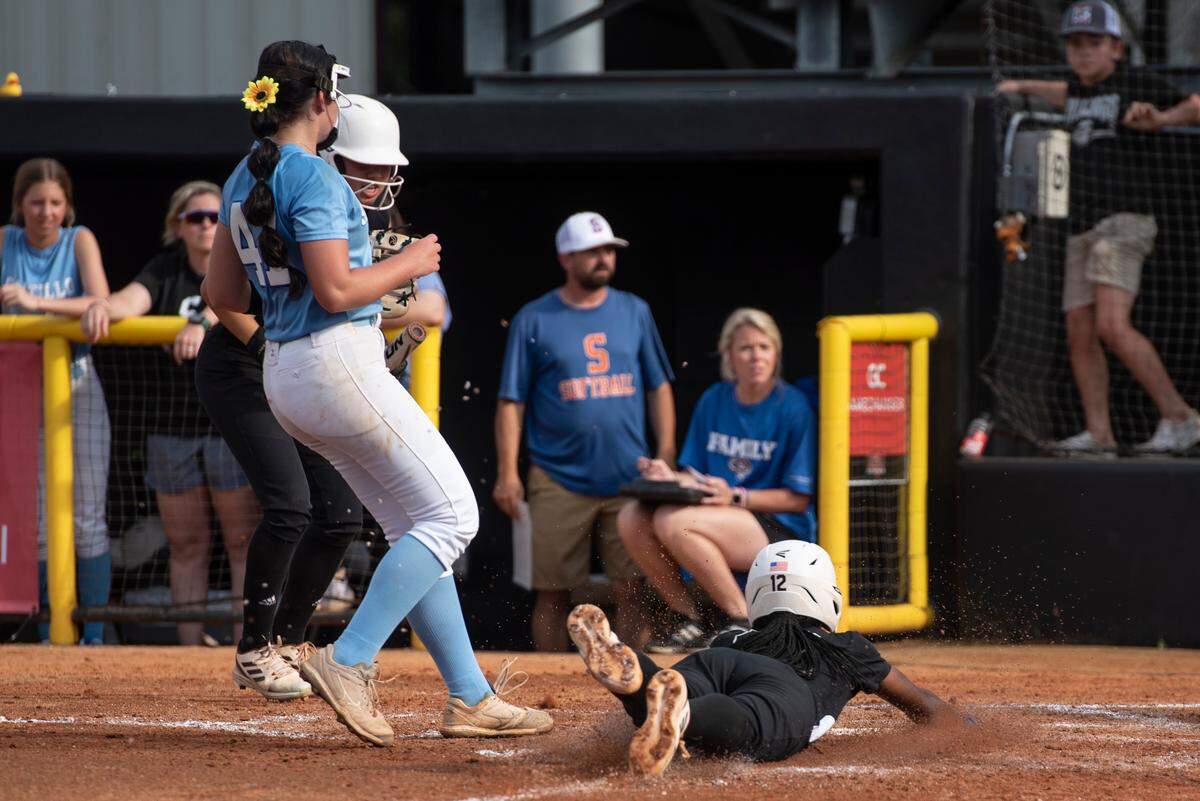 George County Lady Rebels’ Jordyn Bradley slides into home to score a run during the 5A 2023 MHSAA Softball Championship game at USM Softball Complex in Hattiesburg on Thursday, May 18, 2023.