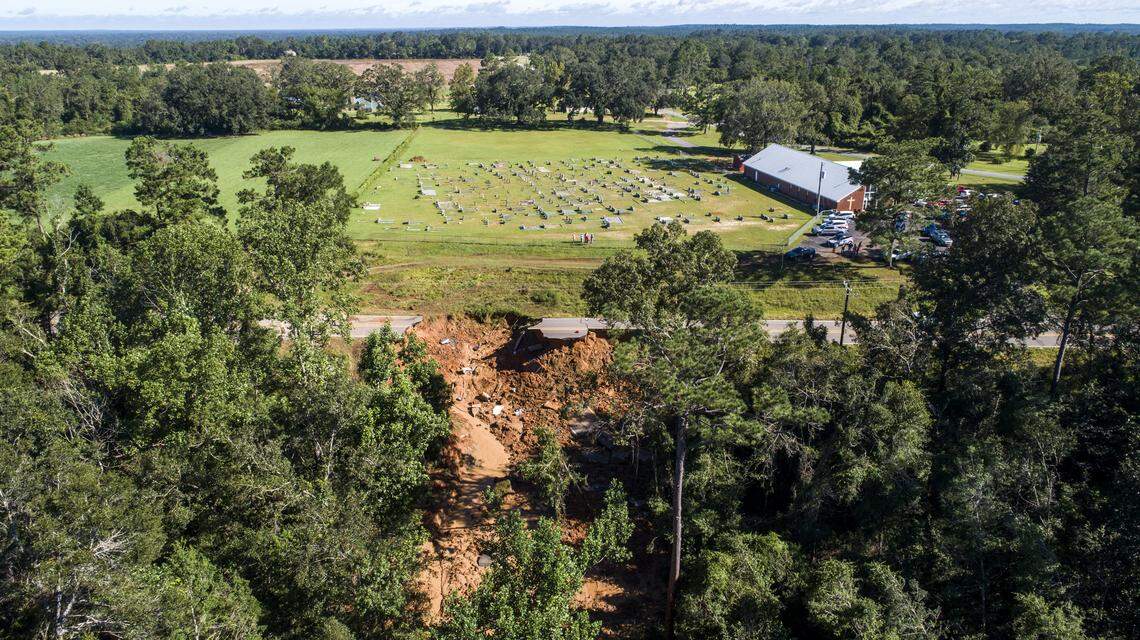 A drone photograph shows the scene where a section Highway 26 collapsed late Monday night, due to heavy rains from Hurricane Ida in the Benndale community in George County, MS Tuesday, Aug. 31, 2021. Two people ere dead and 10 others were injured, three of them critically, the Mississippi Highway Patrol said Tuesday morning.