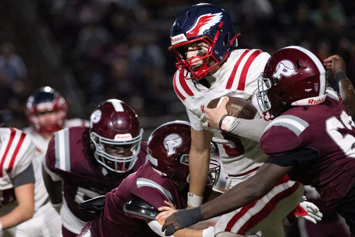 Hancock quarterback Kaison Koenenn (3) dropped Friday in the Hawks’ loss to Picayune.