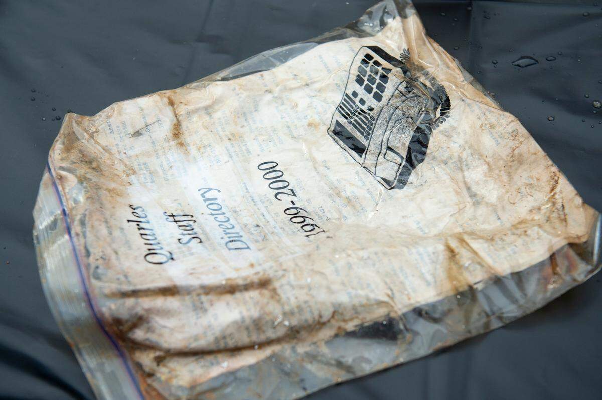 A staff directory for W. J. Quarles Elementary in Long Beach was one of the items from a 1999 time capsule that was dug up and opened on Friday, Dec. 13, 2024.