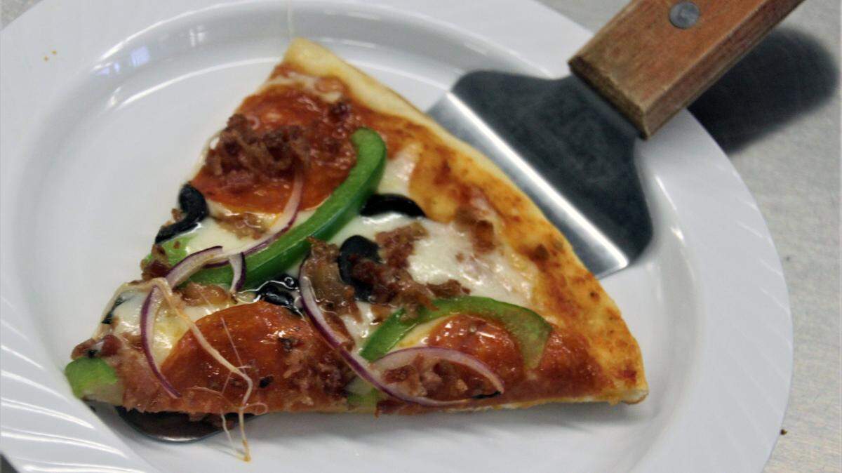 The Supreme Pizza at Adolfo’s Pizzeria in Gulfport.