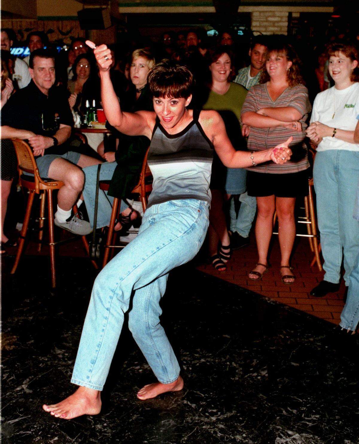Tammy Beaugez of Gulfport struts her stuff during the ”Dance like Elaine” contest at the Bombay Bicycle Club in Biloxi in 1998. The Seinfeld event was sponsored by Live ’95 radio station and led up to the viewing of the final episode of the show. Beaugez was the hands down winner of the contest.