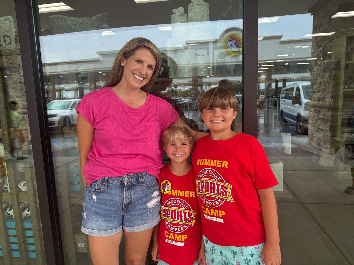 Kristen (from left), Beau and Carter Thornton made their way from Mandeville, Louisiana, to Harrison County for Monday’s Buc-ee’s opening.