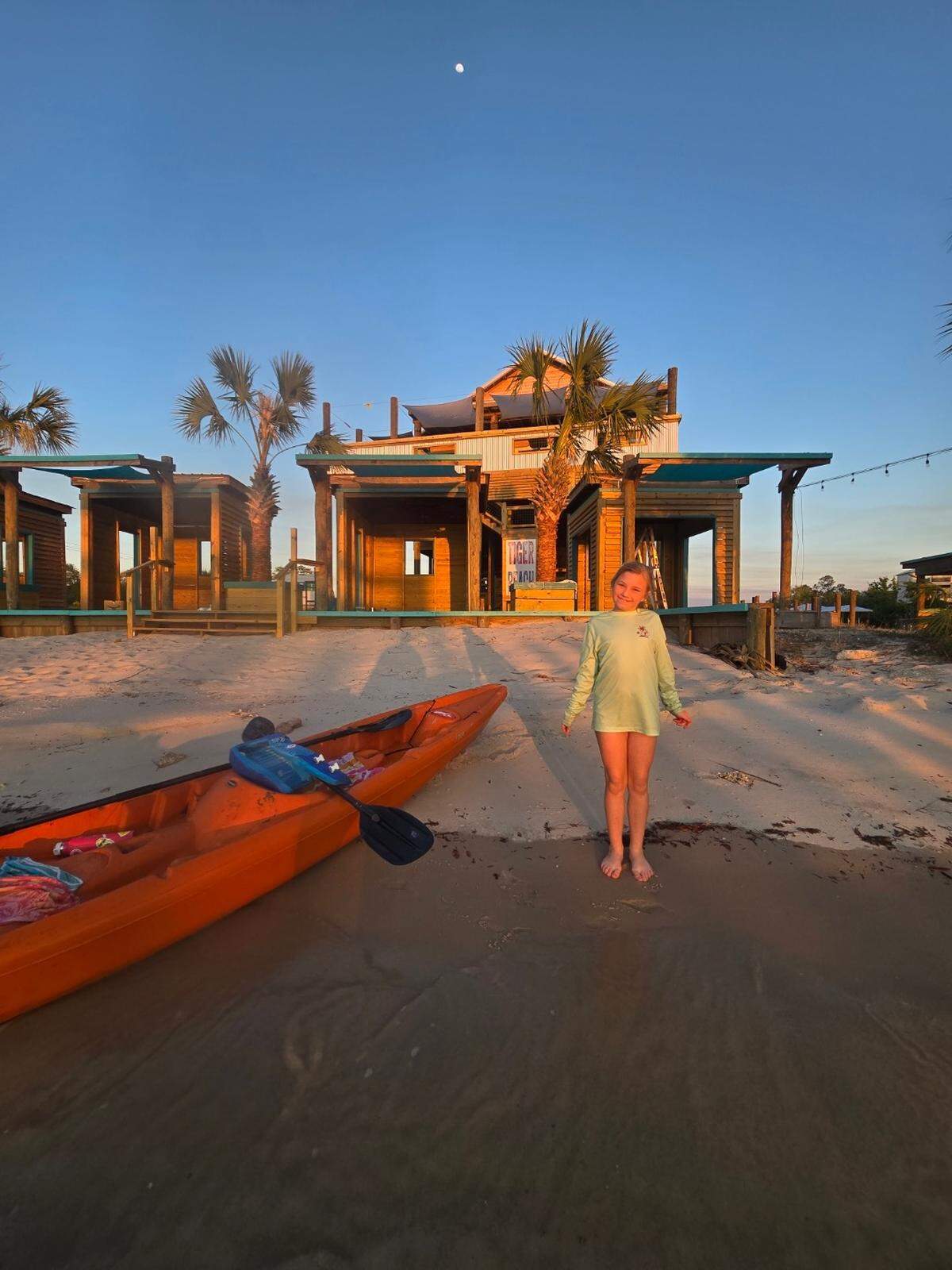 Gracelyn Griffin, 8, of Pass Christian visits Tiger Beach on Henderson Point in western Harrison County. The complex will include a restaurant, outdoor dining and takeout, water taxi, charter boats and much more for boaters, residents and tourists to enjoy.
