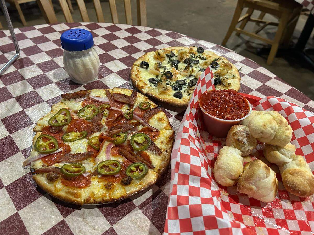 A custom pizza with pepperoni and andouille from Tom’s Extreme Pizzeria in Ocean Springs, Mississippi.