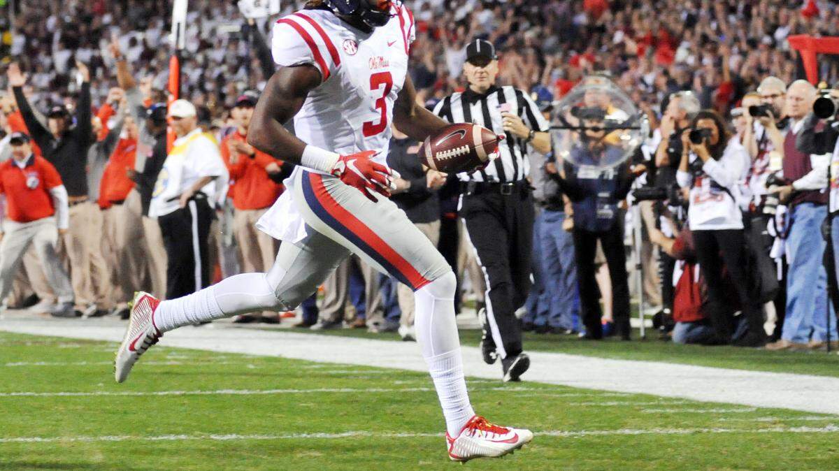 Mississippi wide receiver Damore'ea Stringfellow (3) scores on a pass play against Mississippi State during an NCAA college football game in Starkville, Miss., Saturday, Nov. 28, 2015. (Bruce Newman/The Oxford Eagle via AP) NO SALES; MANDATORY CREDIT